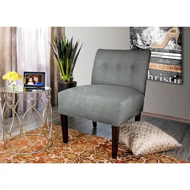Fauteuil d'appoint capitonné à structure métallique, assise semi-ferme rembourrée, pour salon.