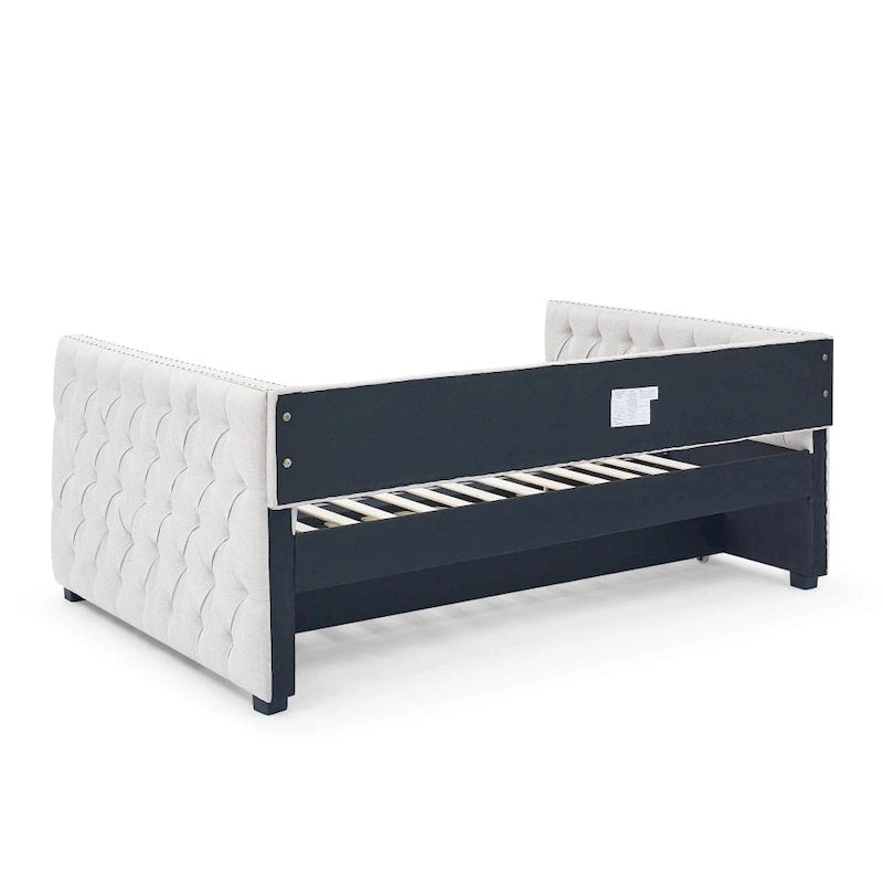 Lit de repos double avec lit gigogne, canapé-lit capitonné, avec boutons et clous en cuivre sur les accoudoirs carrés