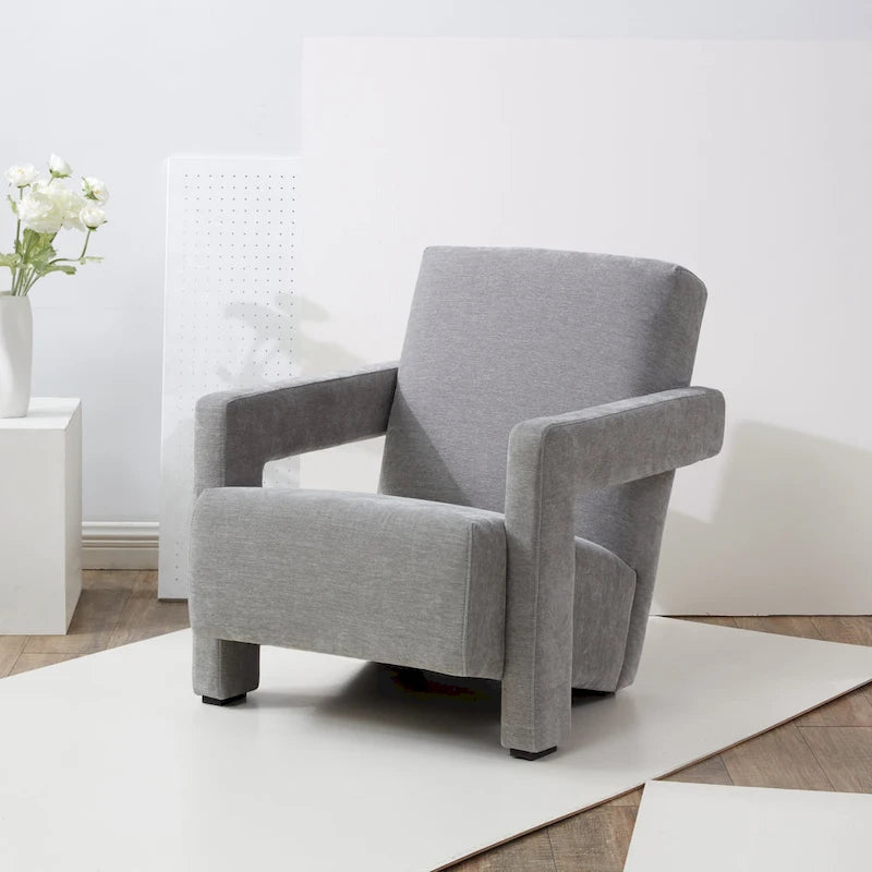 Fauteuil d'appoint moderne en velours, entièrement rembourré, avec dossier incliné, d'inspiration milieu de siècle.