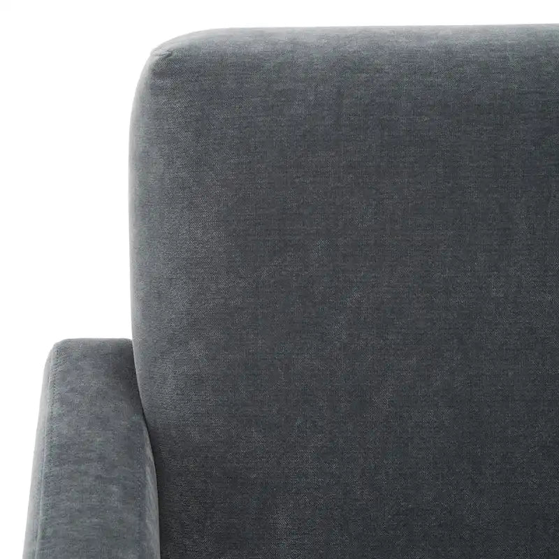 Fauteuil d'appoint moderne en velours, entièrement rembourré, avec dossier incliné, d'inspiration milieu de siècle.