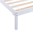 Lit plateforme en bois avec tête de lit