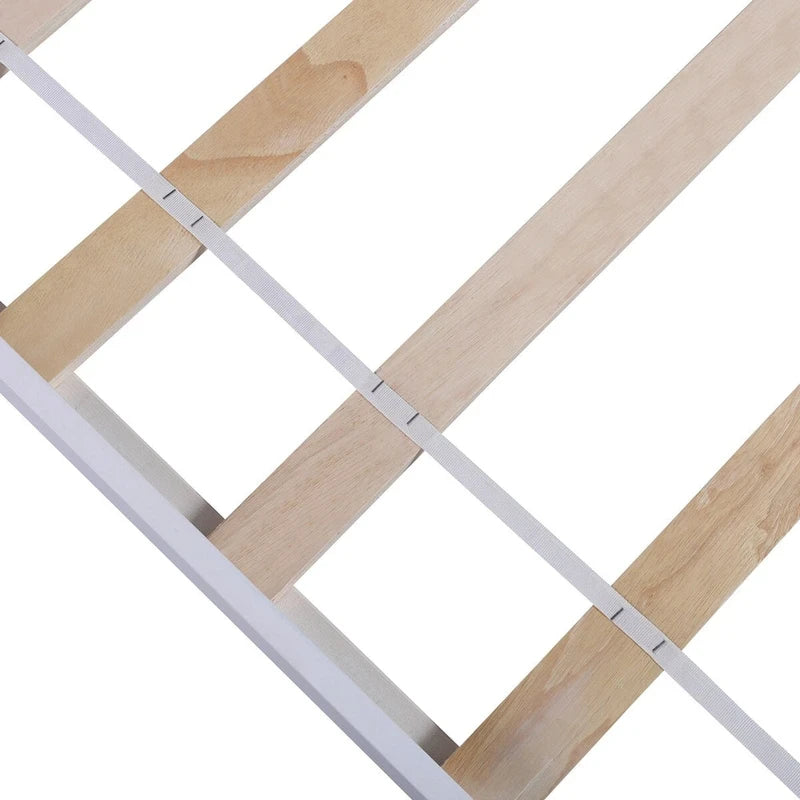 Lit plateforme en bois avec tête de lit