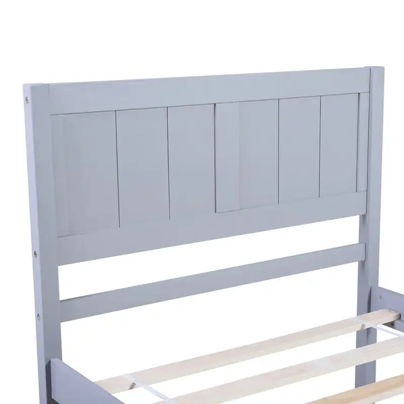 Lit plateforme en bois avec tête de lit