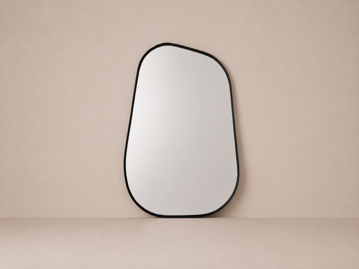 Miroir mural aux formes libres