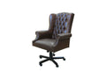 Fauteuil pivotant en cuir capitonné
